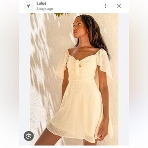 Lulu's Be a Dear Cream Swiss Dot Tie-
Front Skater Dress